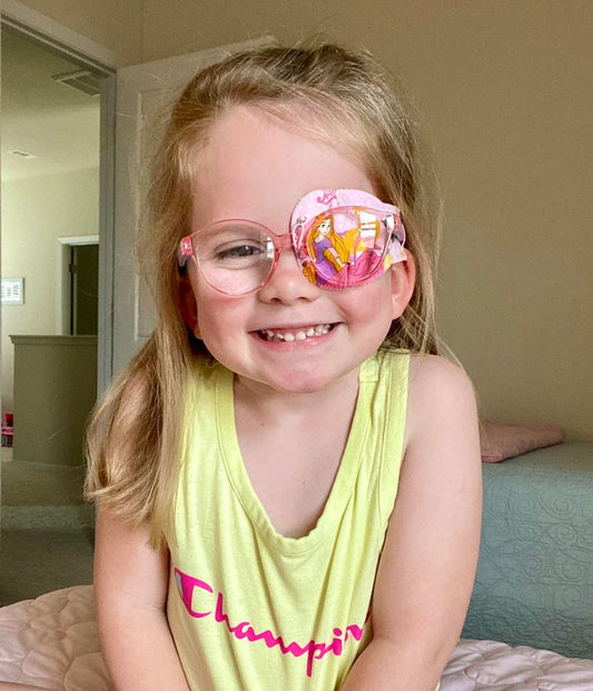 What signs and symptoms might indicate a child is experiencing vision problems?